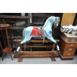 An Edwardian Dapple painted wood Rocking Horse on