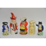 A collection of five Toby Jugs including Mr Punch