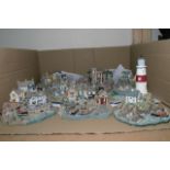 A collection of eight unboxed Lilliput Lane Lifebo