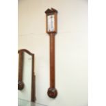A reproduction mahogany stick barometer a committe