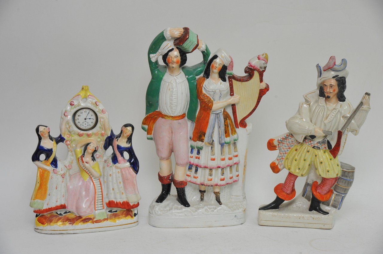 A 19th Century Staffordshire Watch holder figure g