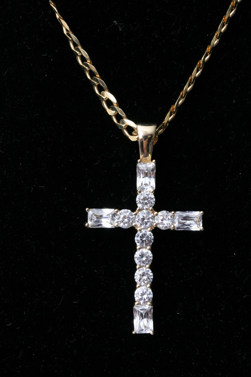 A silver gilt 925 chain attached with 14ct gold CZ