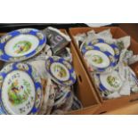 Two boxes containing a decorative Dinner service L