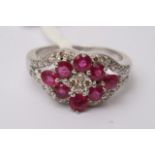 A 14ct white gold, ruby and diamond ring, approx 4