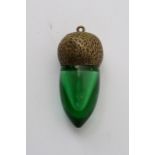 A Victorian miniature green glass scent bottle for
