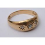 An 18ct Gold Gypsy ring three Diamonds