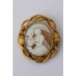 A Victorian cameo brooch depicting a maiden feedin