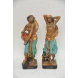 A pair of 1930's plaster figures in the form of Mo