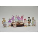 A group of six miniature Coalport ladies presented