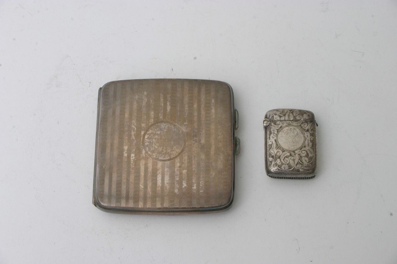 A silver cigarette case, Birmingham hallmarks and