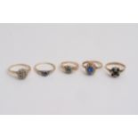 Five gold rings set with diamonds, sapphires and o