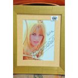A mounted and framed signed Brigitte Bardot photo