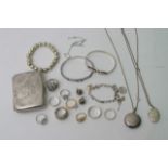 A bag containing various silver Jewellery a silver