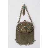An Edwardian chain mesh purse having ornate top ap