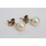 A pair of 9ct gold and cultured pearl stud ear rin