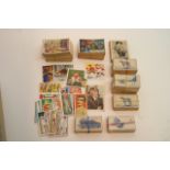 A collection of trade and cigarette cards includin
