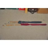 Two 1950's vintage split cane fishing rods, one ma