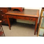 An Early 20th century walnut desk with an inset to