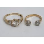 Two 9ct gold rings set with cz stones.