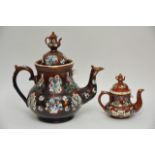 A large Bargeware teapot with applied floral and b