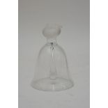 A signed Lalique glass bell surmounted by a bird a