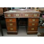 A circa 1920's Campaign style desk, approx 113cm x