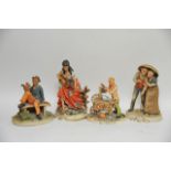 Four Capodimonte figures including a gypsy