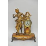 An Astra gilt metal figural mantle clock with flor