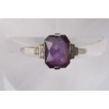 An 18ct platimum ring set with an amethyst, approx