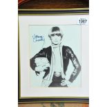 A mounted and framed signed Joanna Lumley