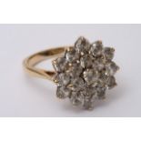 A 9ct gold clustre ring, CZ stones (size O)