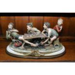 A Capodimonte figural group 'The cheats' by Merli,