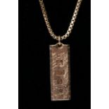 A 9ct gold ingot and chain.approximately 57.8g, le