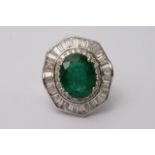 An 18ct white gold, emerald and diamond ring, diam