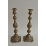 A pair of silver engraved knopped candlesticks, Lo