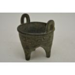 A bronze pot, possibly Indian, approx 10cm width a