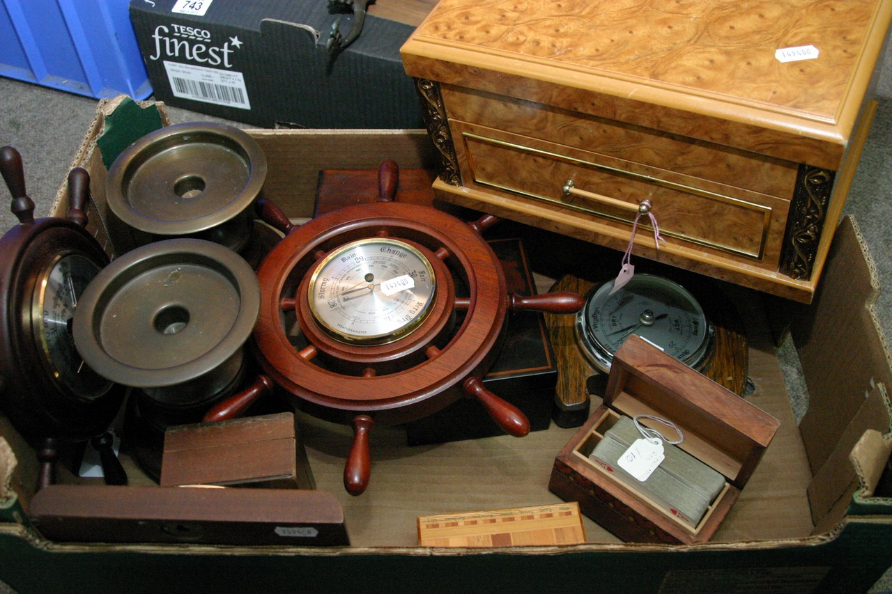 A box of treen including barometers.