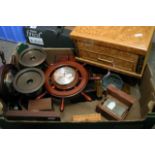 A box of treen including barometers.