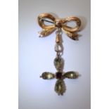 An antique 9ct gold bow and gem set drop brooch, Chester 1911.