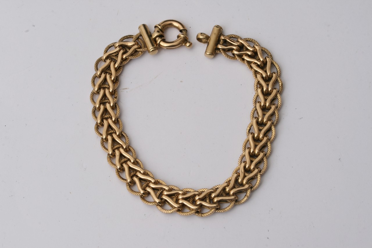 A 9ct gold multi link bracelet