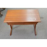 An unusual modern design occasional table with pul