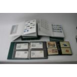 Nine albums of Great Britain postage stamps consis