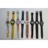 A collection of six advertising watches