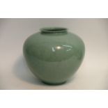 A large Chinese 20th century celadon vase with inc