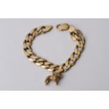 A 9ct gold slab link bracelet with dog charm attac