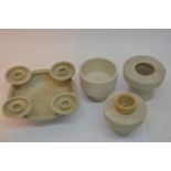 A white glazed studio pottery candle holder with t