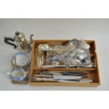 A quantity of silver plated flatware and a saucebo