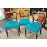 Three dining chairs with upholstered seats and hav