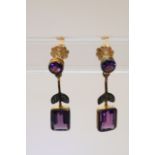 A pair of amethyst drop earrings.