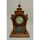 A Continental eight day walnut cased clock with en